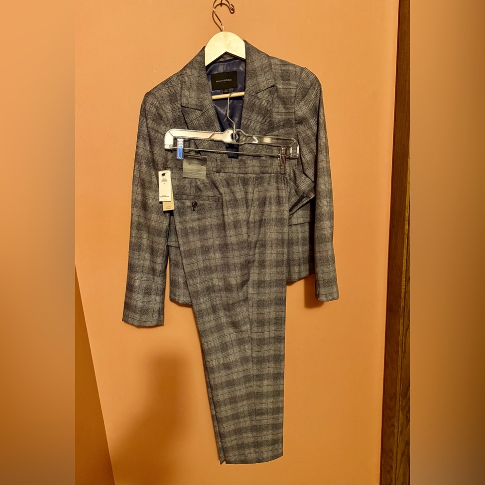 Women’s navy and white plaid suit.